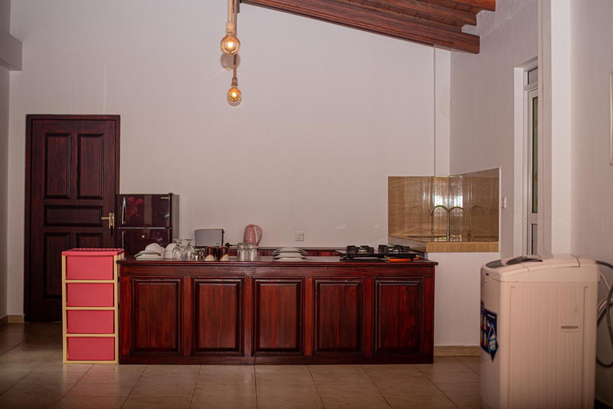 Sundowners Guesthouse Хикадува Стая снимка